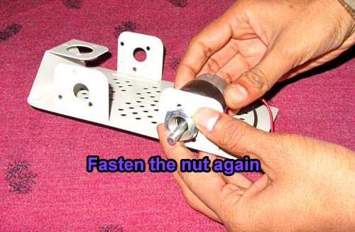 fasten the nut again